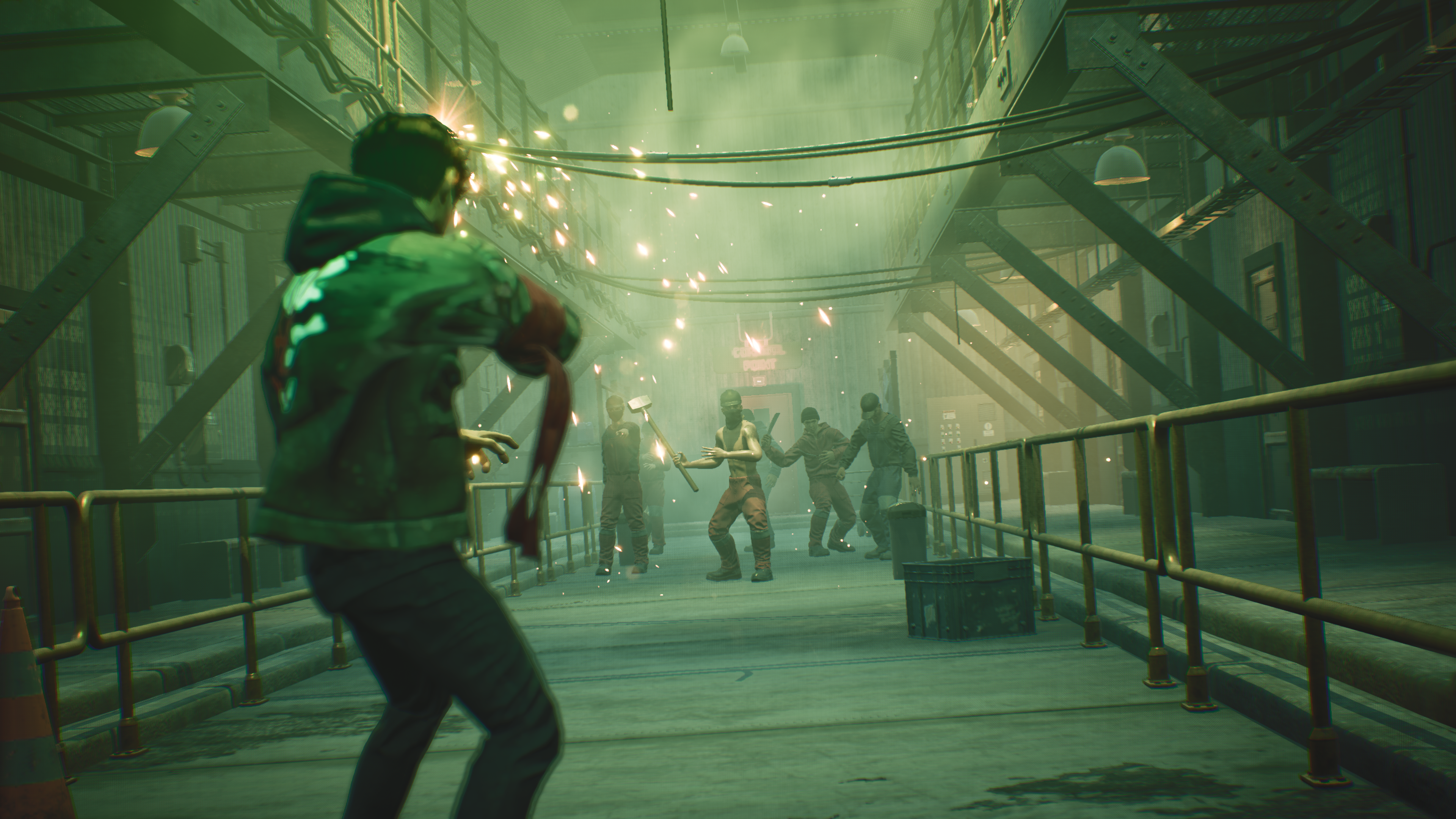 Hendra faces several armed enemies on a factory walkway.